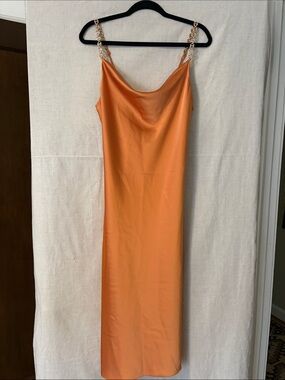 House of Harlow 1960 Orange Midi Dress with gold adjustable straps.
